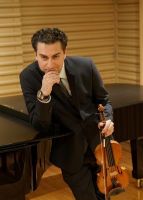 Music Academy for Young Aritsts. Portrait of Iman Khosrowpour, violinist and conductor; founder of the Irvine Music Festival.